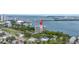 Aerial view of the condo building by the water with multiple boat slips and easy access to the bay at 500 N Osceola Ave # 211, Clearwater, FL 33755