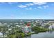Scenic aerial shot features building, waterfront access, and cityscape backdrop at 500 N Osceola Ave # 211, Clearwater, FL 33755