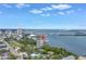 Panoramic aerial view of waterfront condo building with scenic views of the bay and city skyline at 500 N Osceola Ave # 211, Clearwater, FL 33755