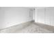 Bright bedroom featuring carpet flooring and closet at 500 N Osceola Ave # 211, Clearwater, FL 33755