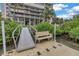 Private dock and seating area off the property, ideal for fishing, boating, and enjoying waterfront breezes at 500 N Osceola Ave # 211, Clearwater, FL 33755