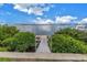 Private dock and seating area off the property, ideal for fishing, boating, and enjoying waterfront views at 500 N Osceola Ave # 211, Clearwater, FL 33755