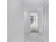 Hallway leads to a large window with tile floor at 500 N Osceola Ave # 211, Clearwater, FL 33755