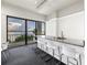 Contemporary kitchen island with bar seating and stunning water views, perfect for casual dining and entertaining at 500 N Osceola Ave # 211, Clearwater, FL 33755