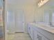 Bathroom featuring double sinks and a shower/tub combo at 5438 Summer Sunset Dr, Apollo Beach, FL 33572