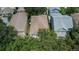 Aerial shot showcasing the roof of the house, set among other houses in a well-maintained neighborhood at 5918 Beaconpark St, Lithia, FL 33547