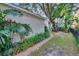 Lush landscaping surrounds a home in this quiet neighborhood at 5918 Beaconpark St, Lithia, FL 33547
