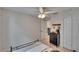 Bedroom showcasing neutral decor and a view to the doorway to the stairway at 5918 Beaconpark St, Lithia, FL 33547