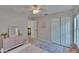 Cozy bedroom with closet, ceiling fan, and coordinating decor at 5918 Beaconpark St, Lithia, FL 33547