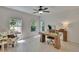 Bright office featuring modern decor, wood floors, and ample natural light from the large windows at 5918 Beaconpark St, Lithia, FL 33547