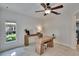 Modern office space with stylish desk, neutral tones, and natural light at 5918 Beaconpark St, Lithia, FL 33547