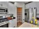 Convenient walk-in pantry with shelving, located adjacent to the kitchen at 5918 Beaconpark St, Lithia, FL 33547