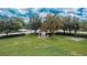 A gazebo provides a pleasant sitting area on the well-manicured lawn of the community park and landscaping at 5918 Beaconpark St, Lithia, FL 33547