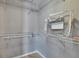 Bright walk-in closet with built-in shelving and storage container at 5918 Beaconpark St, Lithia, FL 33547