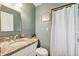 This bathroom features granite countertops, toilet, shower and mirror at 602 Timber Bay W Cir, Oldsmar, FL 34677