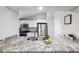 Bright kitchen featuring granite countertops, stainless steel appliances, and ample cabinet space at 602 Timber Bay W Cir, Oldsmar, FL 34677