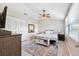 This main bedroom features a ceiling fan, closet and area rug at 602 Timber Bay W Cir, Oldsmar, FL 34677