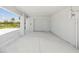 Spacious ground floor garage features ample storage and a door for easy access to covered parking at 6679 Wander Ln, New Port Richey, FL 34652