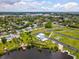Fantastic aerial view showing proximity to the waterfront and the surrounding neighborhood at 6707 Wander Ln, New Port Richey, FL 34654