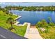 Aerial view of community waterfront boat ramp featuring lush greenery at 6715 Wander Ln, New Port Richey, FL 34654