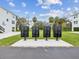 Community mailboxes nestled between well-maintained lawns and modern residences in a friendly neighborhood setting at 6715 Wander Ln, New Port Richey, FL 34654