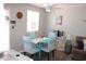 Cozy dining area with coastal-themed decor and ample natural light at 6800 Sunset Way # 1708, St Pete Beach, FL 33706