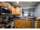 Functional kitchen featuring stainless steel appliances and ample counter space at 6925 Marble Fawn Pl, Riverview, FL 33578