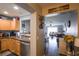 An open floorplan connects the kitchen to the living room, ideal for gatherings at 6925 Marble Fawn Pl, Riverview, FL 33578