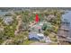 Waterfront home with dock, pool, patio and lush landscaping in a desirable neighborhood at 739 Chesapeake Dr, Tarpon Springs, FL 34689