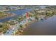 Desirable waterfront property with a private pool, dock, and picturesque views at 739 Chesapeake Dr, Tarpon Springs, FL 34689