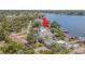 Waterfront home on a large lot with beautiful landscaping and mature trees at 739 Chesapeake Dr, Tarpon Springs, FL 34689