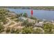 Waterfront home on a large lot with beautiful landscaping and direct access to the bay at 739 Chesapeake Dr, Tarpon Springs, FL 34689