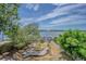 Enjoy stunning water views from this backyard leading to a private boat dock at 739 Chesapeake Dr, Tarpon Springs, FL 34689