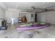 Spacious garage with ample storage space for vehicles and recreational equipment at 739 Chesapeake Dr, Tarpon Springs, FL 34689