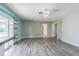 Open-concept space with tile floors and slider doors to outside at 739 Chesapeake Dr, Tarpon Springs, FL 34689