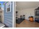 Bright space featuring grooming equipment, dog cages, and laminate flooring, perfect for pet care at 8310 Pat Blvd, Tampa, FL 33615
