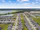 An aerial view shows the community's proximity to lakes and green spaces at 9316 Crescent Ray Dr, Wesley Chapel, FL 33545