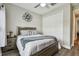 Bedroom featuring ceiling fan and a view to the closet at 9316 Crescent Ray Dr, Wesley Chapel, FL 33545