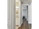 Hallway featuring a view of the bathroom at 9316 Crescent Ray Dr, Wesley Chapel, FL 33545