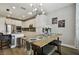 Bright kitchen with stainless steel appliances, ample cabinet space, and an adjacent dining area at 9316 Crescent Ray Dr, Wesley Chapel, FL 33545