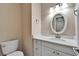 Updated bathroom with neutral walls, updated vanity and modern lighting at 9403 Bellhaven St, Temple Terrace, FL 33637