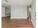 Bright, inviting living room featuring wood floors and an open floor plan at 10039 Old Hickory Ln, Port Richey, FL 34668