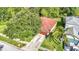 Aerial view showcasing the home's layout, with a large yard and close proximity to neighborhood amenities at 10323 Birdwatch Dr, Tampa, FL 33647