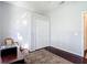 This bedroom has a ceiling fan, hardwood floors, a large closet, and chair rail at 10323 Birdwatch Dr, Tampa, FL 33647