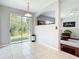 Bright eat-in kitchen area with slider to the back yard and views to the Gathering room at 10323 Birdwatch Dr, Tampa, FL 33647