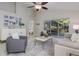 Inviting living room with patio access, stylish decor, and modern furnishings for comfortable living at 10364 Lightner Bridge Dr, Tampa, FL 33626