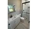 Modern bathroom with glass shower, vanity with drawers and new fixtures at 10999 Del Prado E Dr, Largo, FL 33774