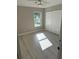 Clean bedroom with new floors, a ceiling fan, and closet doors at 10999 Del Prado E Dr, Largo, FL 33774