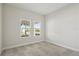 Bedroom featuring carpeted floors, bright windows and fresh neutral paint for a light, airy feel at 11622 Gleaming Ter, Venice, FL 34293