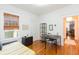 Bright bedroom featuring natural light and hardwood floors at 1202 E Mohawk Ave, Tampa, FL 33604